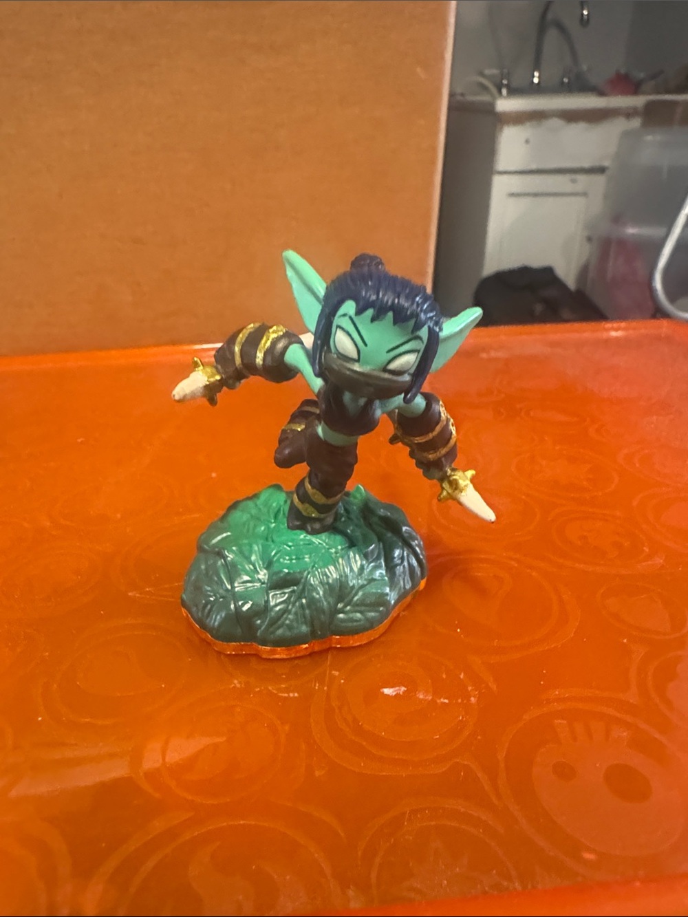 Green Goblin-Like Fantasy Figurine on Leaf Base